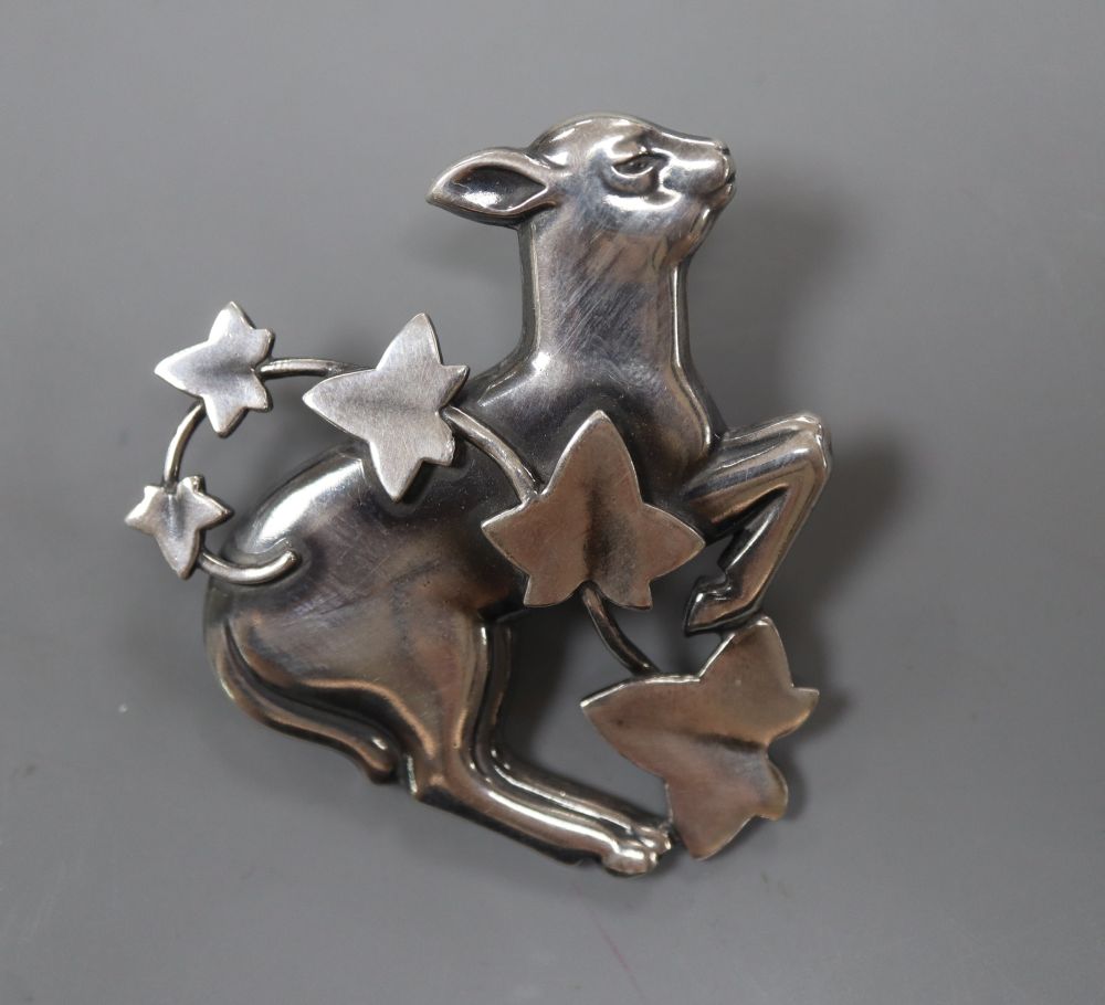 A post 1945 Georg Jensen sterling skipping lamb with ivy brooch, design no. 311, 45mm, gross 18 grams.